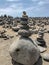 Many stone stacks on the beach near ocean in Teneriffa
