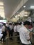 Many students are in the queue to buy lunch at the cafeteria