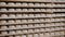 Many sweets white marshmallow stored in wooden racks in the warehouse of the confectionery factory