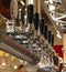 Many taps in stainless steel to draught beer