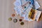 Many tickets for day, for one trip, 9-euro travel subscription lies on table among euro coins and banknotes, monthly travel passes