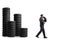Many tires in piles and an auto mechanic worker carrying a tire