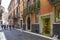 Many tourist on street of the city, in Verona, Italy