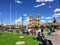 Many tourists admire the view of Plaza de Armas in beautiful and ancient Cusco, Peru.