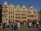 Many tourists in front of medieval guild houses in Brussels Gran Place square