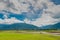 Many tourists ride electric tricycles on the field roads.Landscape View Of Beautiful Rice Fields At Brown Avenue, Chishang,