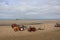many tractors used for cleaning the beach in summer