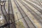 Many train tracks with switches are photographed from above on a marshalling yard near Augsburg on 01.21.2021. Two railway workers