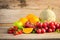 Many types of fruit placed on a wooden floor