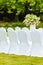 Many wedding chairs with white elegant covers