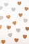 Many wooden hearts on white background