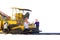 Many workers with equipment helped to build or paver the road with asphalt compactor finisher machine isolated on white background