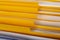 Many yellow files with documents as background, closeup