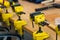 Many Yellow Vises are Set on the Work Bench at the School.