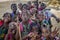 Many young African children with beautifully decorated hair making faces for the camera, Cabinda, Angola, Africa