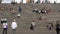 Many young people sit on the steps in front of the Cathedral in Helsinki.