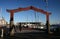 Maori brown entrance gate on coastal boardwalk to Wynyard Quarter at Viaduct Harbor, Auckland, New Zealand