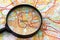 Map of Basel in Switzerland through magnifying glass, travel destination concept