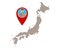 Map of Japan and pin with earthquake symbol