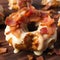 Maple bacon donut, decadent dessert with meat close-up shot