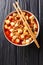 Mapo Tofu classic recipe consists of silken tofu, ground pork, fermented beans, fermented black beans, and Sichuan peppercorn