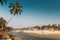 Mapusa, Goa, India. Fishermen Resting Near Pulled Boat From Sea