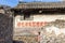 Mar 2014, Chuandixia, Hebei, China: some Maoist slogans from the cultural revolution are still visible on the walls