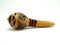 Maraca. Percussion musical instrument. Music. Carved wooden and cane maracas. Rattles Travel memories. Souvenir. Isolated white.