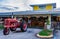 Marando Farms & Ranch farmer`s market with McCormick Farmall tractor at dusk - Davie, Florida, USA