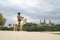 Marapu Sumba Tribe gracefully rides a horse along the shoreline