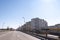 Marasesti street in Bacau on a sunny day. View of local buildings and the orthodox church of the Holy Martyr Dimitrie