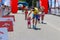 Marathon with children. Kid runners at finish line at summer maraton