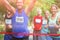 Marathon male athlete crossing the finish line