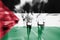 Marathon runner motion blur with blending Palestine flag