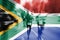 Marathon runner motion blur with blending South Africa flag