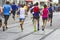 Marathon runners race in city streets