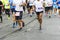 Marathon runners race in city streets