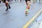 Marathon running race, many runners feet on road racing, sport competition, fitness and healthy lifestyle