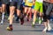 Marathon running race, people feet on road