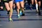 Marathon running race, people feet in shoes