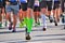 Marathon running race, runners feet on road