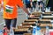 Marathon running road race, runners hand taking food and drinks on refreshment point, sport, fitness and healthy lifestyle