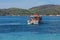 Marathonisi Island, Greece â€“ September 24, 2017:Motorboats at the beach of Turtle island.