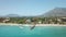 Marbella, golden mile beach, view of Puente Romano Bridge and in Background famous La Concha mountain. Emerald water colour