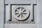 Marble bas-relief depicting the wheel, symbol of the city of Carrara Tuscany with the text Fortidudo Mea In Rota my strength is