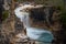 Marble Canyon Waterfall, Kootenay National Park, Canada in full force, taken with a long exposure to smooth out the