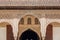 Marble capitals and stucco decoration of the portico in Court of Myrtles in Comares Palace Alhambra, Andalusia, Spain. Magic