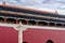 Marble carved columns Huabiao against on the background of the historic building of the Imperial Palace Forbidden City