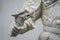 Marble dragon statue in the hands of a warrior in a Buddhist temple in the city of Danang, Vietnam