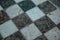 Marble floor texture with white and dark tiles